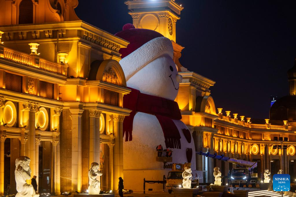 This photo shows a giant snowman at the Qunli music park in Harbin, northeast China's Heilongjiang Province, Dec. 15, 2025. This year's giant snowman, 19 meters in height and made with some 3,000 cubic meters of snow, is one meter taller than that of last year. (Xinhua/Zhang Tao)