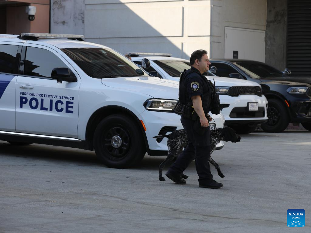 A police officer of the U.S. Department of Homeland Security is on duty at the Metropolitan Detention Center in Los Angeles, California, the United States on Dec. 15, 2025. Four people accused of plotting New Year's Eve bombings in California have been arrested, U.S. authorities said Monday. (Photo by Qiu Chen/Xinhua)