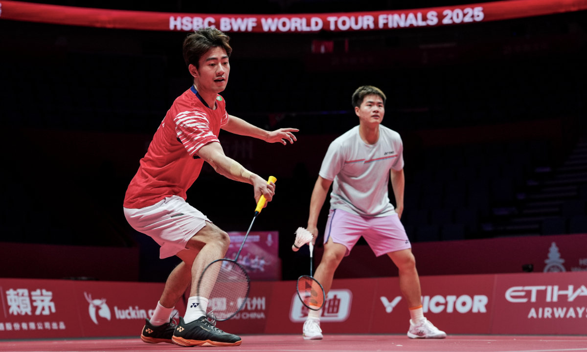 Chinese badminton players Wang Chang (left) and Liang Weikeng practice during a training session ahead of the BWF World Tour Finals at the Hangzhou Olympic Sports Centre Gymnasium on December 16, 2025 in Hangzhou, East China's Zhejiang Province. Photo: VCG