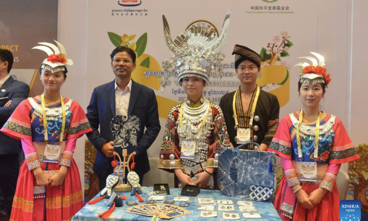 This photo taken on Dec. 15, 2025 shows Chinese and Cambodian youth attending the 2025 Silk Road People-to-people Connectivity China-Cambodia Exchange Event in Phnom Penh, Cambodia. The event was held here in the Cambodian capital on Monday, aiming to deepen exchanges and cooperation between the two countries' youth. (Photo by Phearum/Xinhua)