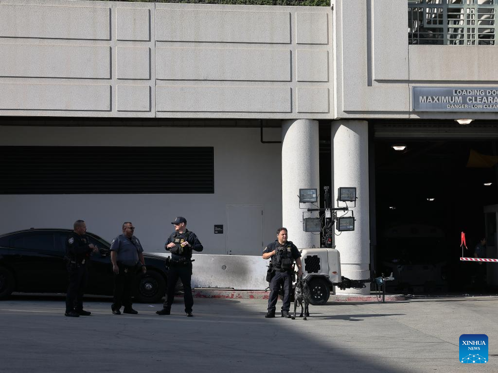 Police officers of the U.S. Department of Homeland Security are on duty at the Metropolitan Detention Center in Los Angeles, California, the United States on Dec. 15, 2025. Four people accused of plotting New Year's Eve bombings in California have been arrested, U.S. authorities said Monday. (Photo by Qiu Chen/Xinhua)