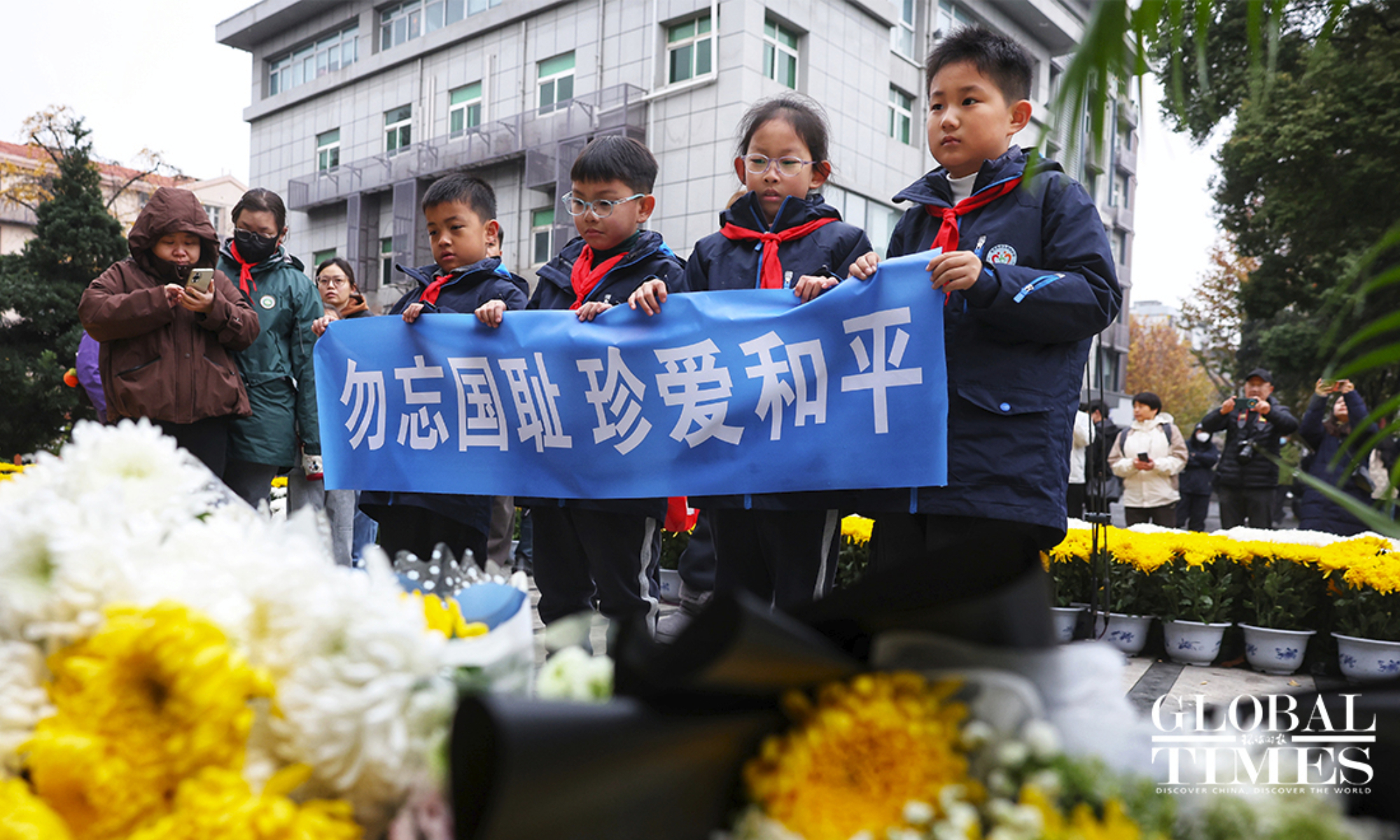 China holds national memorial ceremony for Nanjing Massacre victims; victim families, Nanjing residents warn against resurging Japanese militarism