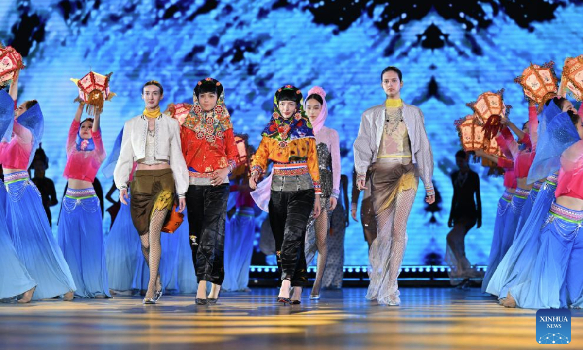 Models and actresses perform a fashion show of intangible cultural heritage at the opening ceremony of the 2025 Maritime Silk Road International Cultural Tourism Festival in Quanzhou, southeast China's Fujian Province, on Dec. 11, 2025. (Xinhua/Jiang Kehong)
