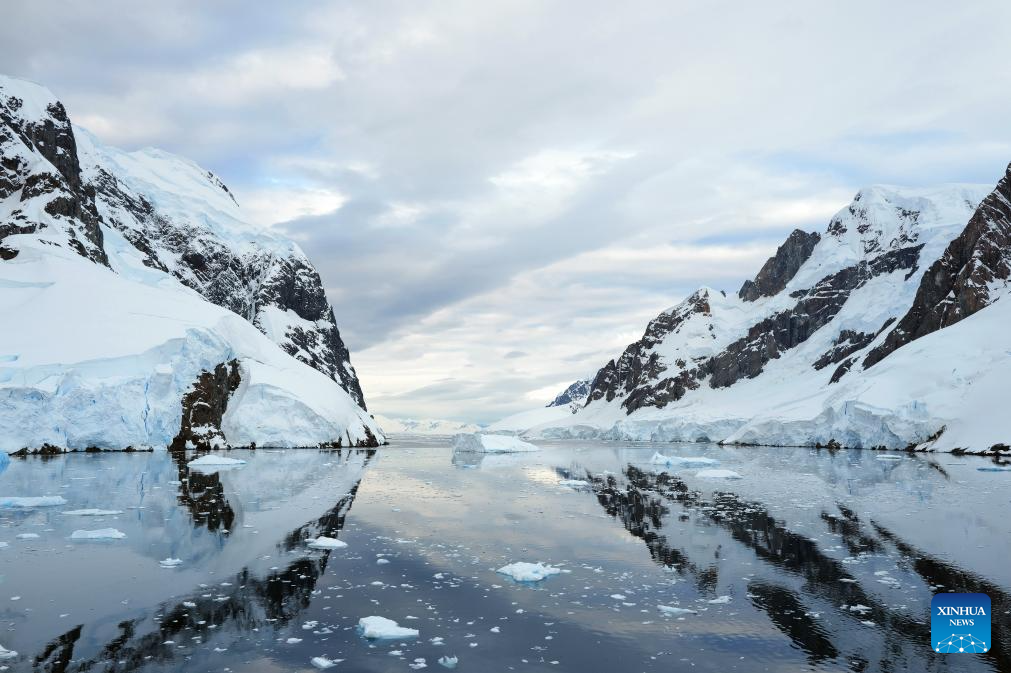 This photo taken on Dec. 12, 2025 shows the Lemaire Channel in Antarctica. The Antarctic ice and snow melt in large quantities during the height of summer, when the weather is relatively mild and the days are long. It is not only the high season for penguins to mate and hatch their chicks, but also the best time for whale watching. (Photo by Yang Shu/Xinhua)
