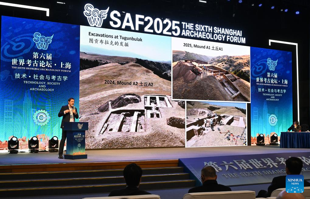 Michael Frachetti, professor from Washington University in St. Louis of the United States, introduces his research interests during the sixth Shanghai Archaeology Forum (SAF2025) in Shanghai, east China, on Dec. 16, 2025. Jointly hosted by the Chinese Academy of Social Sciences, Shanghai Municipal People's Government and the National Cultural Heritage Administration of China, the SAF2025 themed on Technology, Society and Archaeology has attracted nearly 300 experts and scholars from over 40 countries and regions around the world to attend. (Xinhua/Li He)