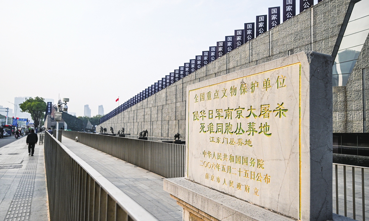 A visitor walks outside the Memorial Hall of the Victims in Nanjing Massacre by Japanese Invaders on December 11, 2025. Photo: VCG