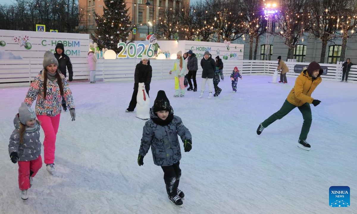 People skate on an ice rink at a Christmas market in St. Petersburg, Russia, Dec. 13, 2025. A Christmas market opened here on Saturday for the upcoming Christmas and New Year holidays. (Photo by Irina Motina/Xinhua)
