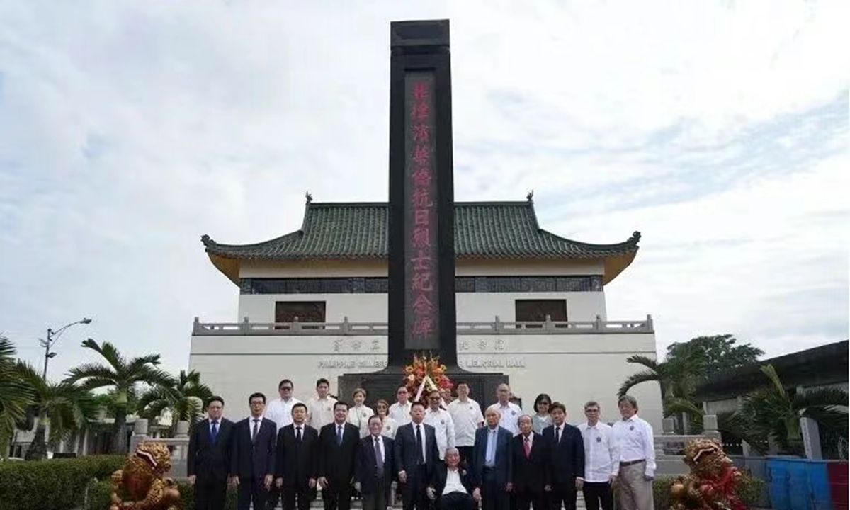 Chinese Ambassador to the Philippines Jing Quan led embassy diplomats and members of overseas Chinese organizations to the Manila Chinese Cemetery to pay tribute to Yang Guangsheng, China's consul general in Manila who was killed by Japanese troops in 1942, as well as seven fallen heroes including diplomats and members of the Philippine Chinese anti-Japanese guerrilla forces, on Decemeber 13, 2025. Photo: Chinese Embassy in the Philippines