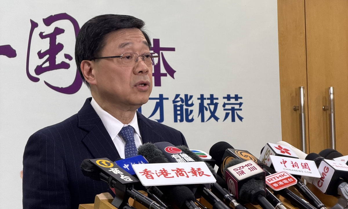The Hong Kong Special Administrative Region Chief Executive John Lee speaks with reporters in Beijing on December 16, 2025. Photo: Chen Qingqing/GT

