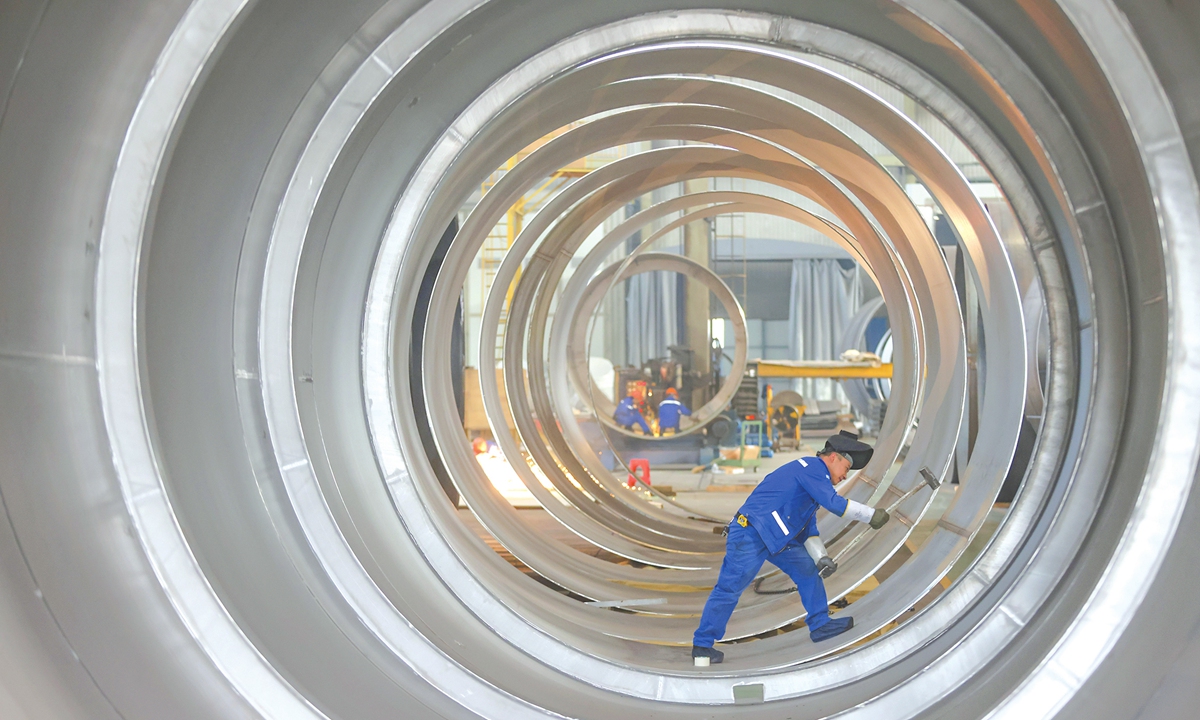 Workers fill orders for photovoltaic products for shipment to Southeast Asian countries in a workshop in Huzhou, East China's Zhejiang Province, on December 16, 2025. Data from the National Bureau of Statistics showed that from January to November, the value-added of industrial enterprises above designated size increased by 6.0 percent year-on-year. In November alone, it grew 4.8 percent year-on-year. Photo: VCG