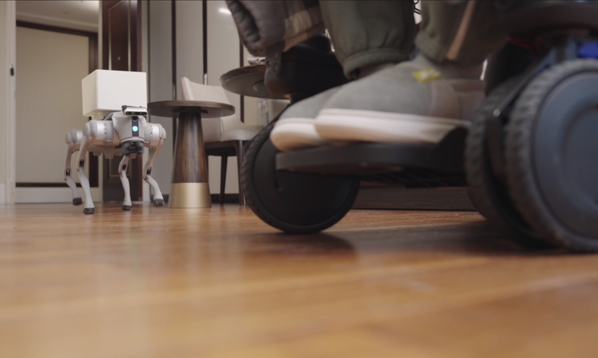 A patient controls a robotic dog during the BCI clinical trail. Photo: Courtesy of the CEBSIT