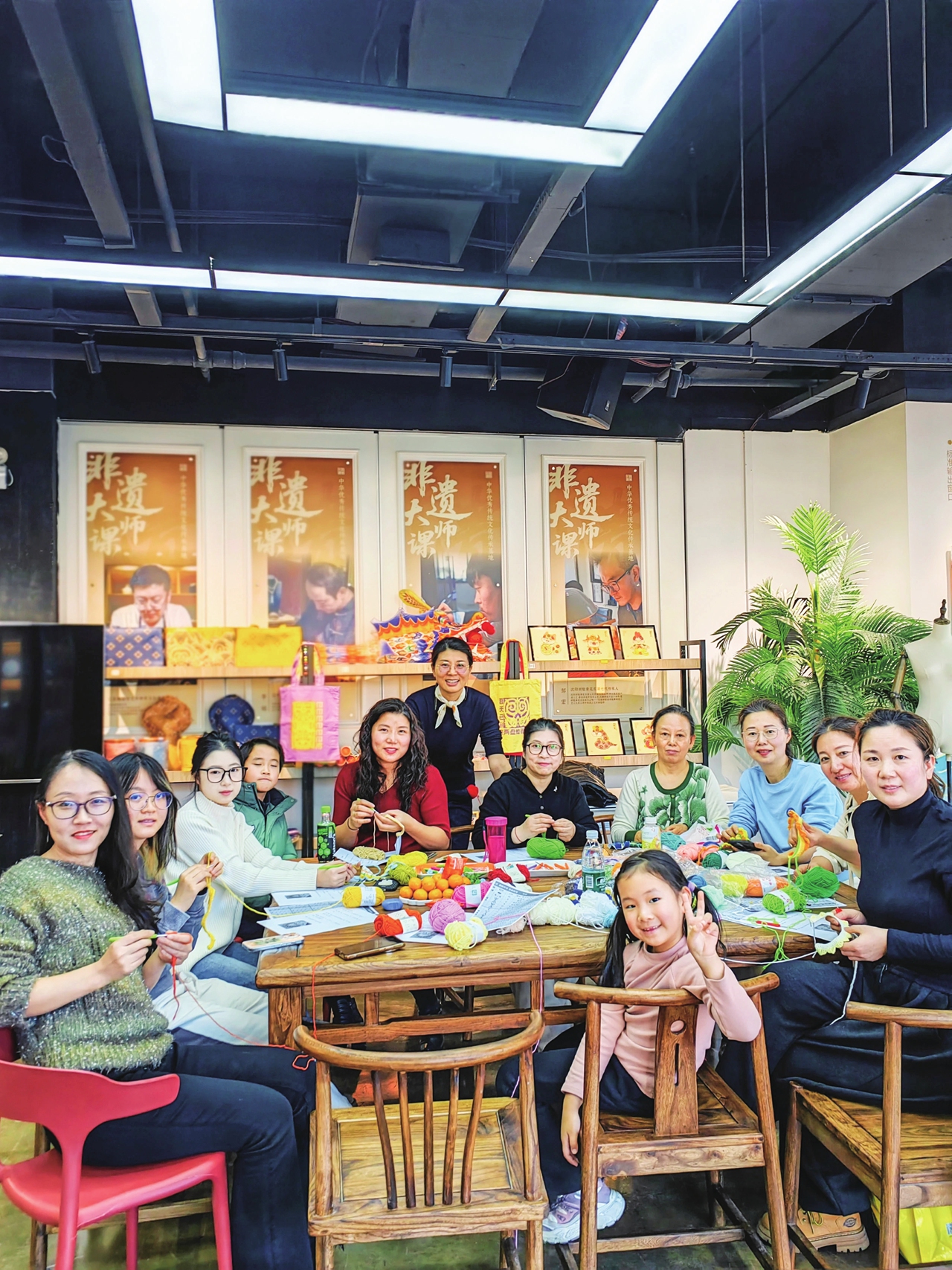 People at a meetup session for knitting pet collars pose for a picture on December 7, 2025. Photo: Courtesy of Enya