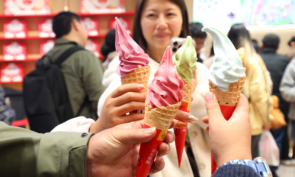 Consumers enjoy ice cream at the world's largest Mixue flagship store opened in Southwest China's Chongqing Municipality on November 29, 2025. Photo: VCG
