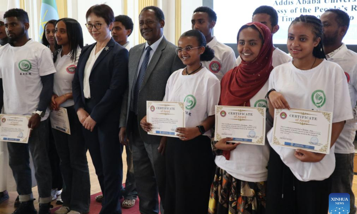 Participants of the 2025 China-Ethiopia Friendship Award pose for a group photo in Addis Ababa, the capital of Ethiopia, Dec. 19, 2025. (Xinhua/Liu Fangqiang)
