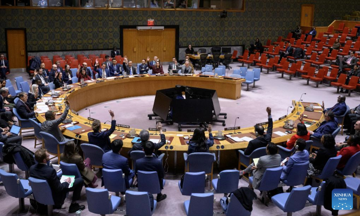 Representatives vote on a draft resolution during a Security Council meeting at the UN headquarters in New York, Dec. 19, 2025. The UN Security Council on Friday unanimously adopted a resolution to renew the mandate of the UN peacekeeping mission in the Democratic Republic of the Congo (DRC) for one year, until Dec. 20, 2026. (Loey Felipe/UN Photo/Handout via Xinhua)