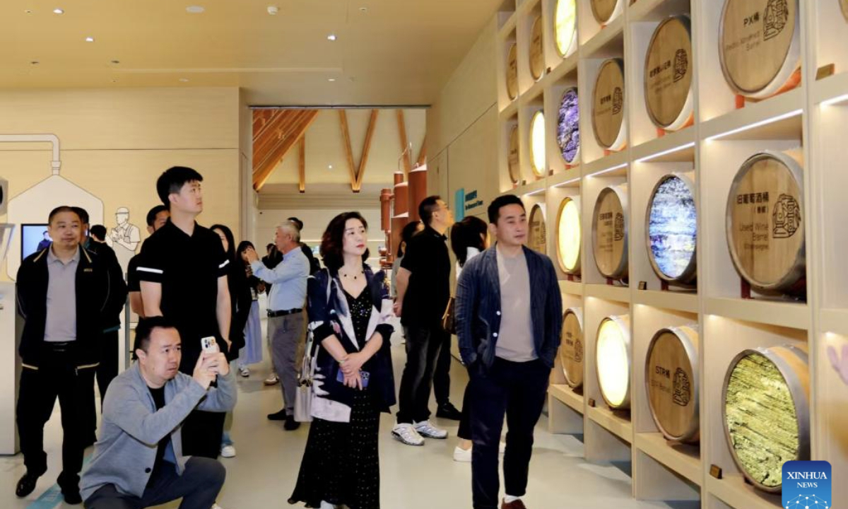 People visit the experience center upon its opening at Laizhou Distillery in Qionglai City, Chengdu, southwest China's Sichuan Province, April 29, 2025. (Xinhua)