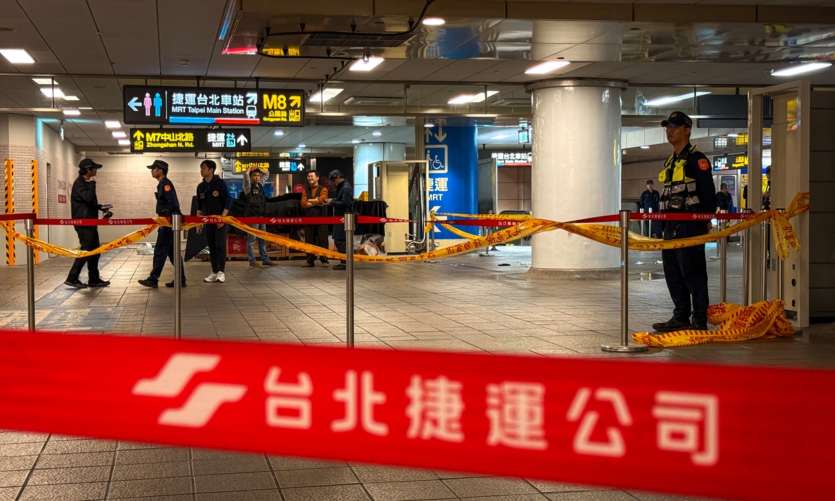 Investigators secure the perimeter after several smoke grenades were set off inside the Taipei Main Station in Taipei, China's Taiwan region, on 19 December 2025. Four deaths, including the suspect, and six injuries were reported after a suspect allegedly threw multiple smoke grenades inside Taipei Main Station. Photo: VCG