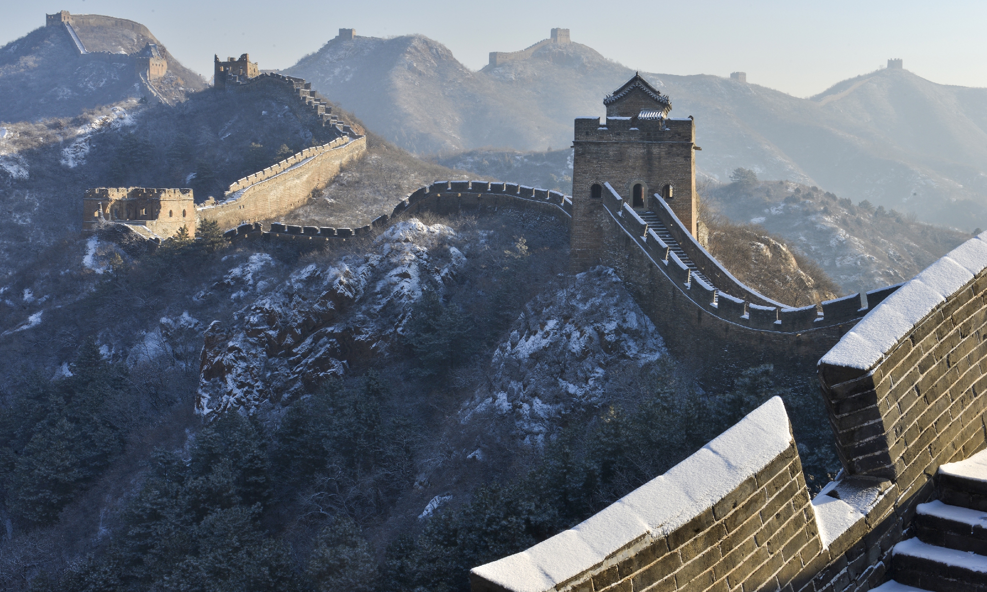 Jinshanling section of the Great Wall is coated by light snow in Luanping County of Chengde, North China's Hebei Province on December 23, 2025. Photo: cnsphoto