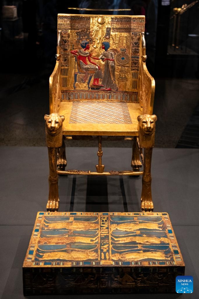 This photo taken on Dec. 20, 2025 shows the Golden Throne & Footstool at the King Tutankhamun exhibition hall of the Grand Egyptian Museum in Giza, Egypt. The Grand Egyptian Museum (GEM) opened its doors to the public on Nov. 4, establishing itself as one of the world's largest displays of ancient relics, and a high-tech fort dedicated to heritage conservation.

The main galleries display thousands of previously stored antiquities for the first time, housing the complete collection of some 5,992 artifacts from the tomb of the boy-king Tutankhamun. (Xinhua/Xin Mengchen)