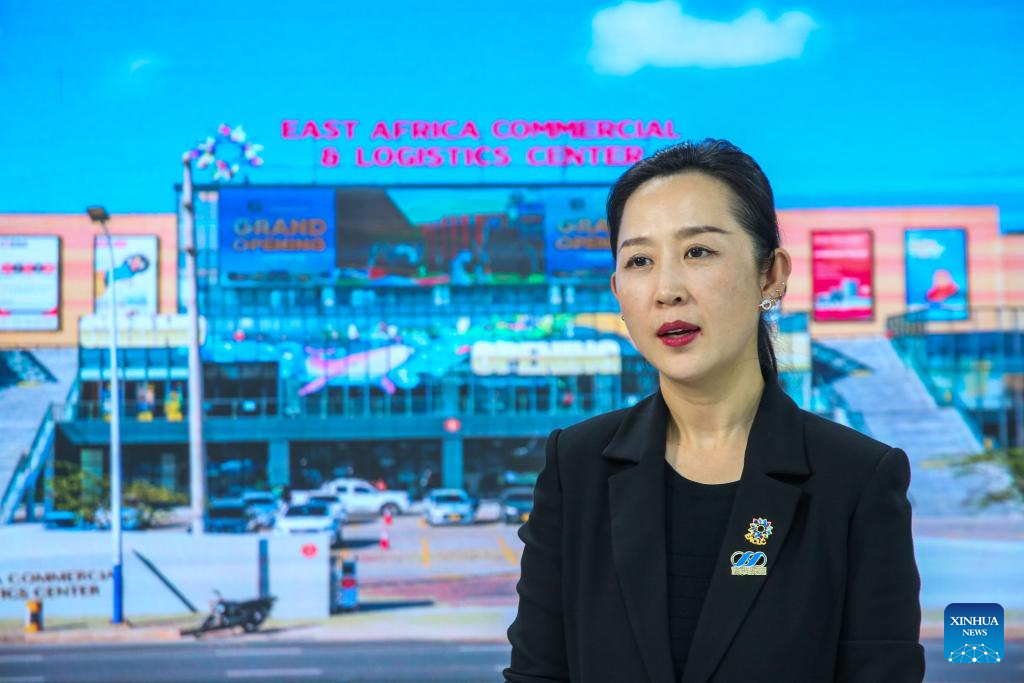 Cathy Wang, general manager of the East Africa Commercial and Logistics Center (EACLC), speaks during an interview with Xinhua in Dar es Salaam, Tanzania, Dec. 19, 2025. (Xinhua/Emmanuel Herman)