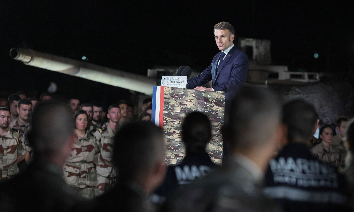 France's President Emmanuel Macron addresses French troops during a ceremony at the 5th Cuirassier Regiment's base in Zayed Military City, near Abu Dhabi, on December 21, 2025. Macron confirms that the country plans to replace its sole and ageing nuclear-powered aircraft carrier Charles de Gaulle with a new one. Photo: VCG