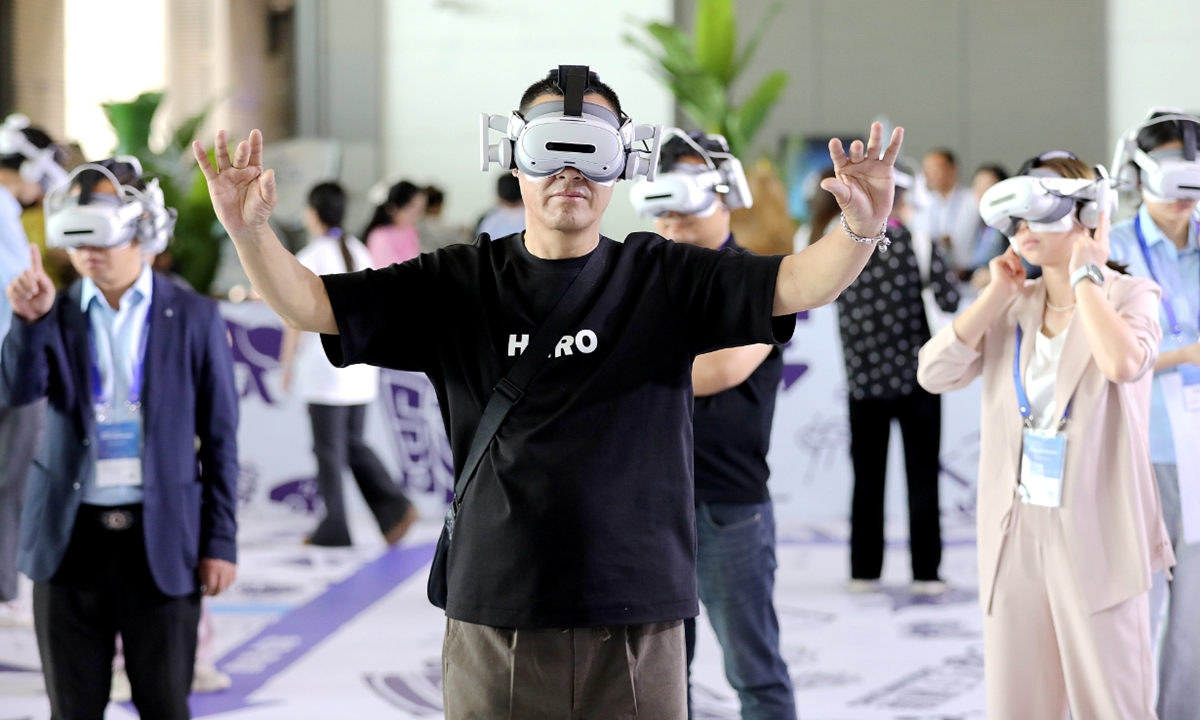 Visitors experience immersive VR tourism in Xi'an, Northwest China's Shaanxi Province. Photo VCG