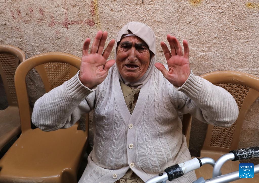 A Palestinian mourns during the funeral of a 22-year-old man, Ahmed Said Zayoud, in the town of Silat al-Harithiya, northwest of the West Bank city of Jenin, Dec. 21, 2025. Two Palestinians were killed by Israeli forces in separate incidents in the northern West Bank on Saturday, the Palestinian Ministry of Health said. (Photo by Nidal Eshtayeh/Xinhua)
