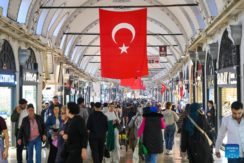 This file photo taken on Nov. 24, 2025 shows tourists visiting the Grand Bazaar in Istanbul, Türkiye. Foreign tourist arrivals in Türkiye reached 2.8 million in November, highlighting the country's sustained tourism growth, as the total number of foreign visitors reached 50.06 million in the first 11 months of the year, according to statistics released by the Ministry of Culture and Tourism on December 22. (Xinhua/Liu Lei)