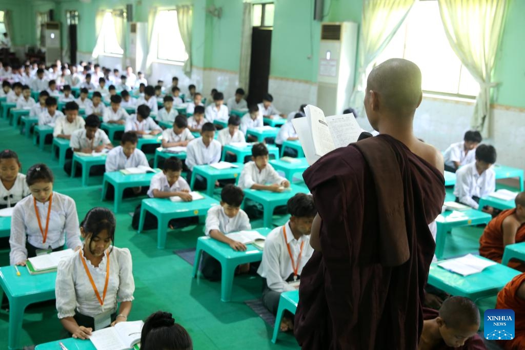 A Buddhist monk teaches a lesson during a meditation course at a post-primary monastic school in Yangon, Myanmar, Dec. 11, 2025. (Xinhua/Myo Kyaw Soe)