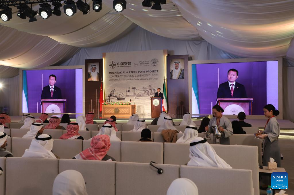 Liu Xiang, charge d'affaires at the Chinese Embassy in Kuwait, speaks during the signing ceremony of an engineering, procurement and construction (EPC) contract for the first phase of the Mubarak Al-Kabeer Port project on Boubyan Island in Jahra Governorate, Kuwait, Dec. 22, 2025.
The Kuwaiti Ministry of Public Works and China Communications Construction Company Limited (CCCC) on Monday signed an EPC contract for the first phase of the Mubarak Al-Kabeer Port project on Boubyan Island in northern Jahra Governorate. (Xinhua/Yin Ke)