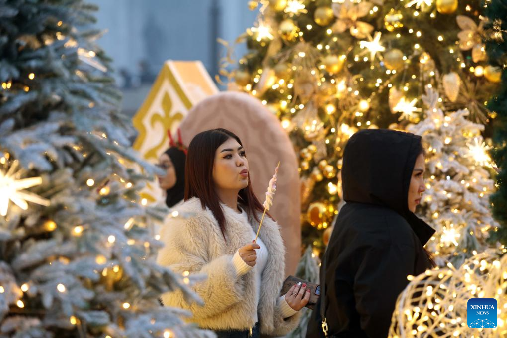 People visit the Ala-Too Square during a New Year event in Bishkek, Kyrgyzstan, Dec. 23, 2025. (Photo by Roman/Xinhua)