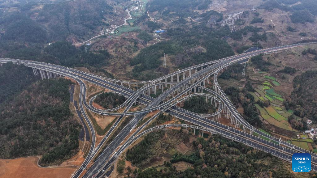 An aerial drone photo shows the Pingtang interchange along the Guiyang-Pingtang Expressway in southwest China's Guizhou Province, Dec. 23, 2025. The Guiyang-Pingtang Expressway has successfully passed the acceptance inspection on Wednesday and is set to open for operation soon.

The expressway starts from Yangchang Town in Wudang District of Guiyang City, and ends at Yunyang Pass in Pingtang County of Qiannan Bouyei and Miao Autonomous Prefecture. The project covers a total length of 174.018 kilometers with a designed speed of 100 kilometers per hour. (Xinhua/Tao Liang)