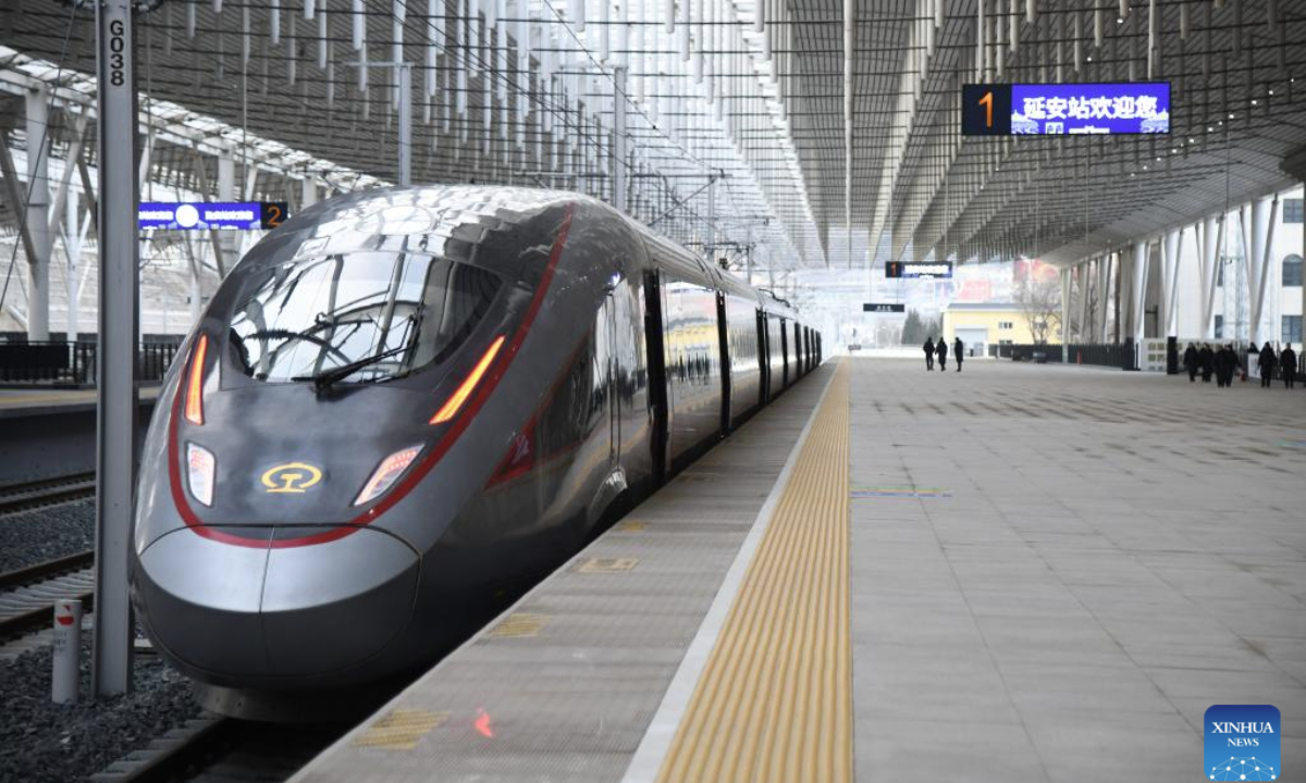 A Fuxing bullet train is pictured at Yan'an Station of the new Xi'an-Yan'an high-speed railway in northwest China's Shaanxi Province, on Dec. 26, 2025. (Xinhua/Zhang Bowen)