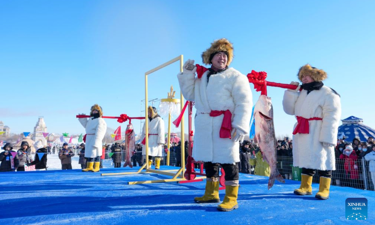 People perform during a winter fishing event of a Nadam fair in Mongolian Autonomous County of Dorbod, Daqing City, northeast China's Heilongjiang Province, Dec. 27, 2025. An ice and snow Nadam fair featuring winter fishing kicked off here on Saturday. The integrated development fishery, and cultural and tourism industry in Dorbod has not only boosted tourism market, but also increased the income of local fishermen. (Xinhua/Wang Song)