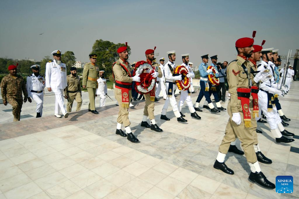 Security officials attend a ceremony marking the 149th birth anniversary of the founder of Pakistan Muhammad Ali Jinnah in Karachi, Pakistan on Dec. 25, 2025. Born on Dec. 25, 1876, Jinnah led a movement to get a separate homeland for the Muslims of the British-ruled Indian subcontinent in 1947. (Str/Xinhua)