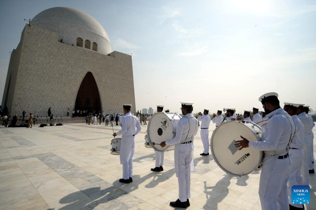 Security officials attend a ceremony marking the 149th birth anniversary of the founder of Pakistan Muhammad Ali Jinnah in Karachi, Pakistan on Dec. 25, 2025. Born on Dec. 25, 1876, Jinnah led a movement to get a separate homeland for the Muslims of the British-ruled Indian subcontinent in 1947. (Str/Xinhua)