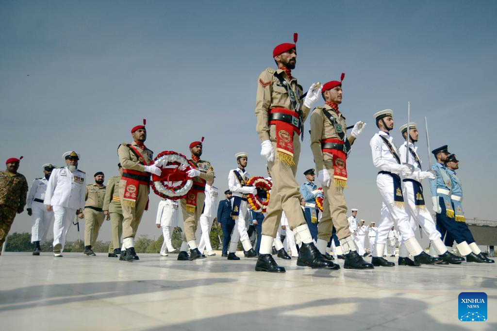 Security officials attend a ceremony marking the 149th birth anniversary of the founder of Pakistan Muhammad Ali Jinnah in Karachi, Pakistan on Dec. 25, 2025. Born on Dec. 25, 1876, Jinnah led a movement to get a separate homeland for the Muslims of the British-ruled Indian subcontinent in 1947. (Str/Xinhua)