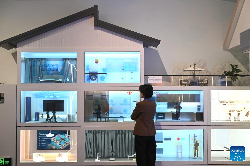 This photo taken on Dec. 29, 2025 shows a model of smart home kit at the exhibition Forging the Path to National Strength: China's Manufacturing Achievements under the 14th Five-Year Plan at the National Museum of China in Beijing, capital of China. With more than 300 pieces (sets) exhibits, the exhibition kicked off here on Monday, showcasing China's manufacturing achievements under the 14th Five-Year Plan. (Xinhua/Jin Liangkuai)