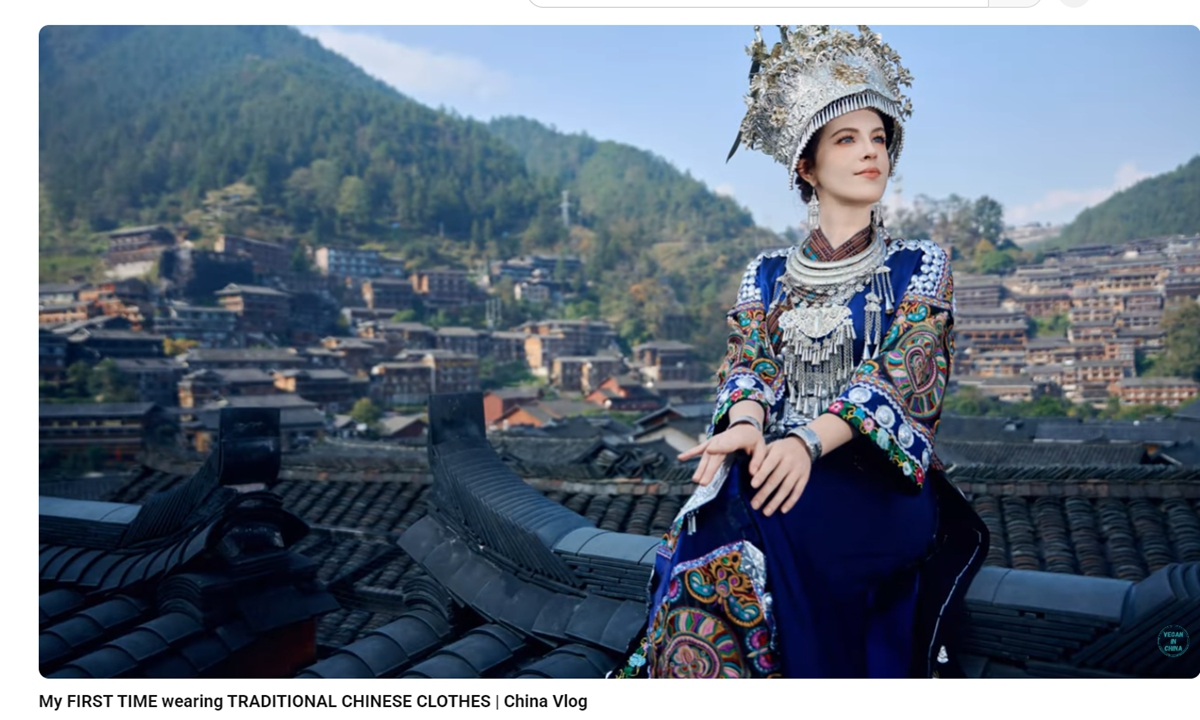 Canadian vlogger Alex shares a video of herself taking portraits in the traditional clothing of the Miao people, an ethnic group in China, in January 2025. Photo: Screenshot from Alex's YouTube account