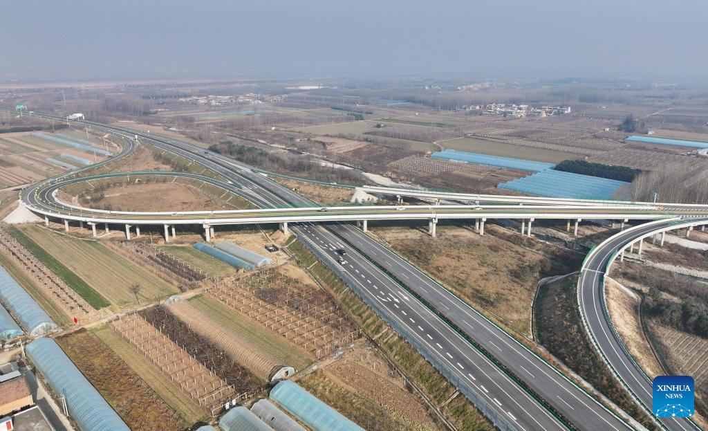 This aerial drone photo taken on Dec. 29, 2025 shows a section of the expressway linking Meixian County and Taibai County in northwest China's Shaanxi Province. The 75-km-long expressway linking Meixian County and Taibai County in Shaanxi started operation on Monday. (Xinhua/Zhang Bowen)