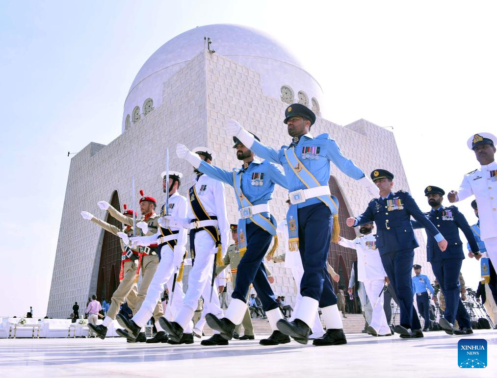 Security officials attend a ceremony marking the 149th birth anniversary of the founder of Pakistan Muhammad Ali Jinnah in Karachi, Pakistan on Dec. 25, 2025. Born on Dec. 25, 1876, Jinnah led a movement to get a separate homeland for the Muslims of the British-ruled Indian subcontinent in 1947. (Str/Xinhua)