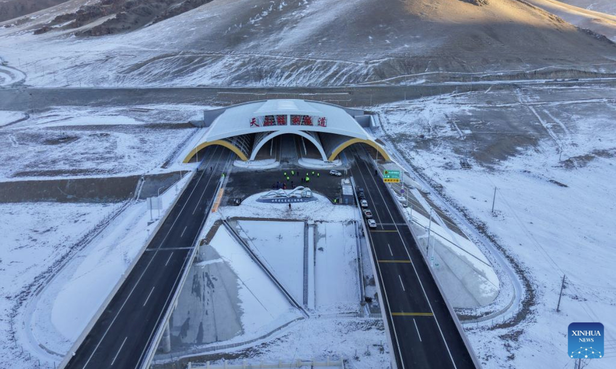 An aerial drone photo shows an exterior view of Tianshan Shengli Tunnel on Urumqi-Yuli Expressway in northwest China's Xinjiang Uygur Autonomous Region, Dec. 26, 2025. (Xinhua/Hu Huhu)
