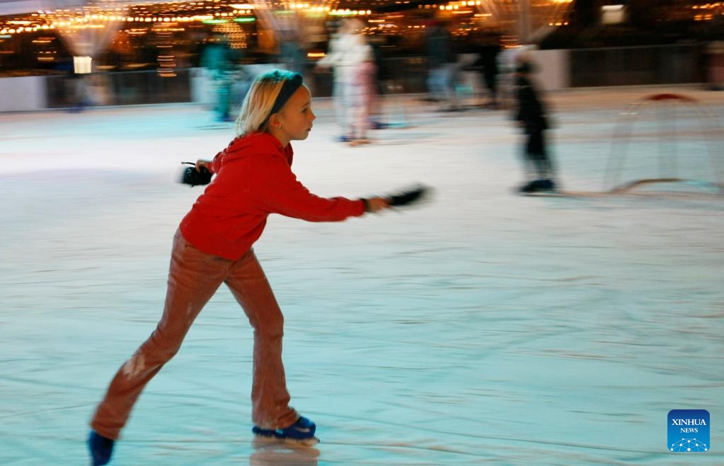 A girl skates on an ice rink in the Hague, the Netherlands, Dec. 27, 2025. (Xinhua/Shao Haijun)