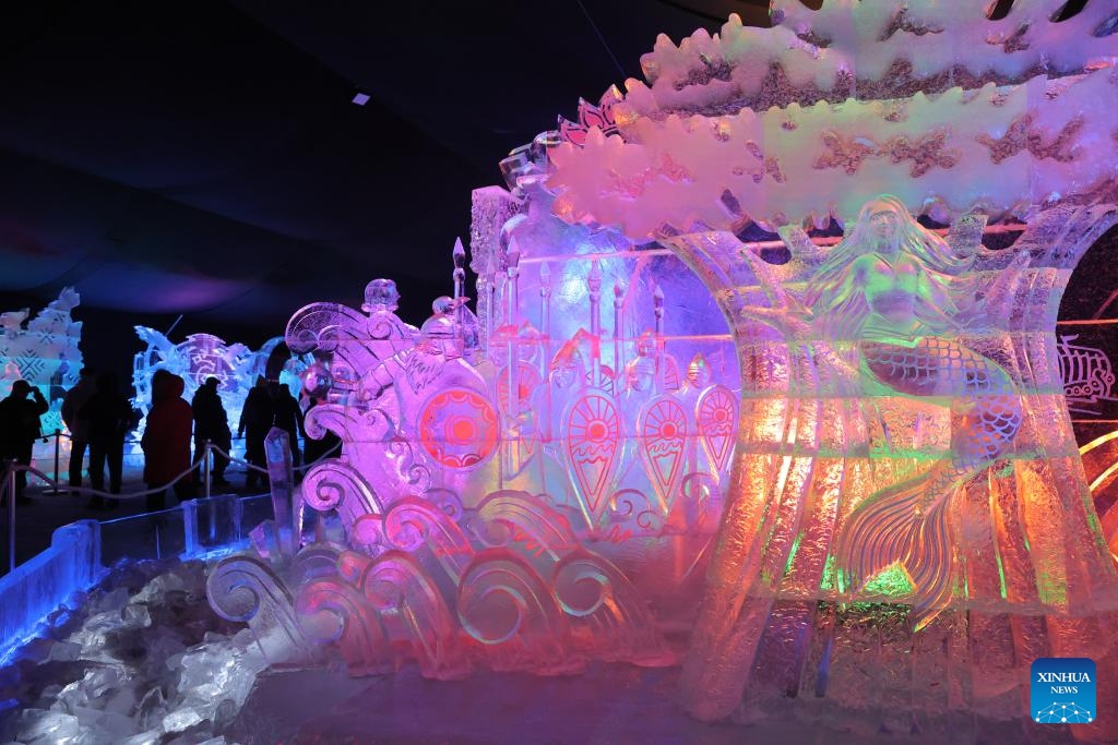 People visit an ice sculpture festival in St. Petersburg, Russia, Dec. 27, 2025. The event kicked off here on Saturday. (Photo by Irina Motina/Xinhua)