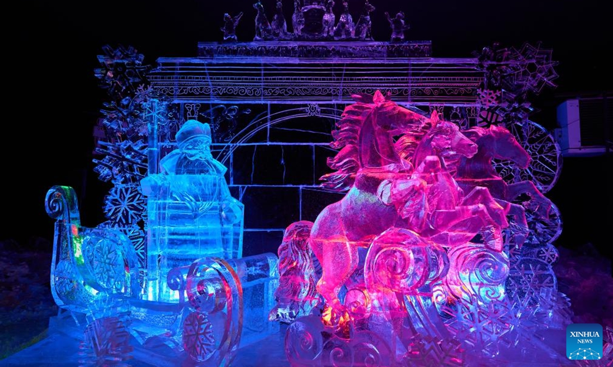 This photo shows an exhibit titled Father Frost at an ice sculpture festival in St. Petersburg, Russia, Dec. 27, 2025. The event kicked off here on Saturday. (Photo by Guo Feizhou/Xinhua)