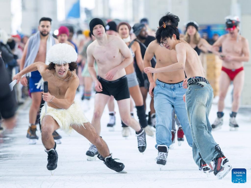 People participate in the 2025 Toronto Polar Bear Skate event in Toronto, Canada, on Dec. 28, 2025. About 160 skaters participated in this annual event to bid farewell to 2025 on Sunday. (Photo by Zou Zheng/Xinhua)