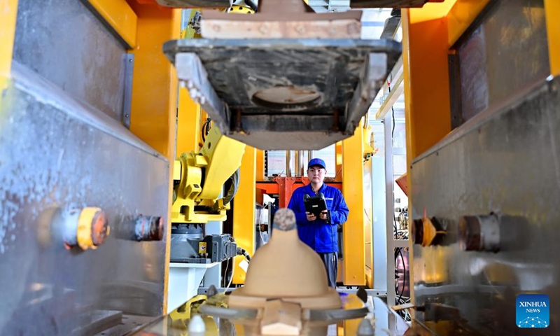 A staff member adjusts a mould at a ceramic machinery company in Fengnan District of Tangshan, north China's Hebei Province, Dec. 28, 2025. In recent years, Fengnan District of Tangshan has actively pursuing opportunities to develop new quality productive forces, boosting high-quality development. (Xinhua/Yang Shiyao)