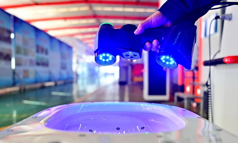 A staff member tests a detecting instrument at a ceramic machinery company in Fengnan District of Tangshan, north China's Hebei Province, Dec. 28, 2025. In recent years, Fengnan District of Tangshan has actively pursuing opportunities to develop new quality productive forces, boosting high-quality development. (Xinhua/Yang Shiyao)