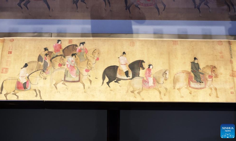 This photo taken on Dec. 29, 2025 shows a Song Dynasty (960-1279 AD) replica of the painting Lady Guoguo's Spring Outing at Liaoning Provincial Museum in Shenyang, northeast China's Liaoning Province. The painting, attributed to Tang Dynasty (618-907 AD) court painter Zhang Xuan, is one of the figure painting masterpieces depicting aristocratic women. The work will be on display at Liaoning Provincial Museum from Dec. 30, 2025 to March 29, 2026. (Xinhua/Li Gang)