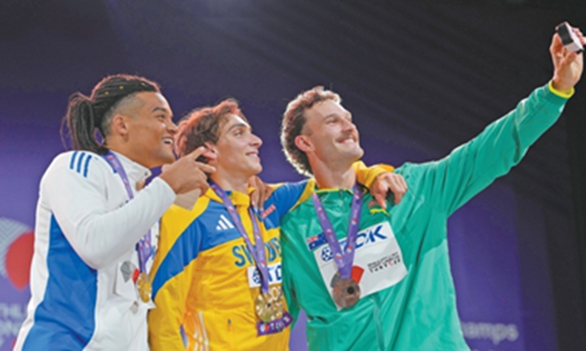 Athletes take a selfie at the World Athletics Championships in Tokyo. Photo: Xinhua